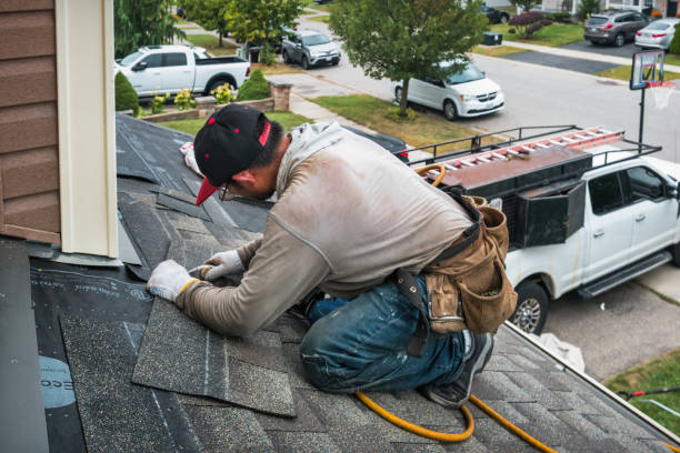 Professional Gutter Repair And Installation technician working in Kensington, NY